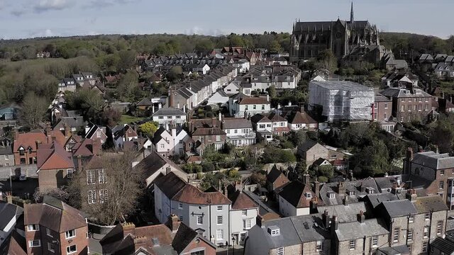 Aerial video of Arundel Cathedral which is in a dominate position overlooking the old historic town of Arundel in West Sussex, Southern England.