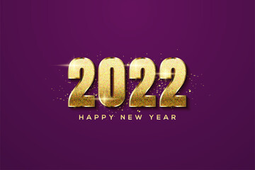 2022 happy new year with bold gold numbers.