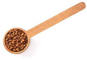 Barley Tea in the wooden spoon, isolated on white background, top view