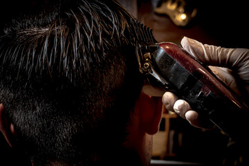cut styles with scissors and machines in a vintage men's barbershop