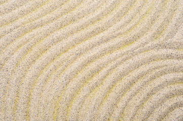 Fototapeta na wymiar Sea sand texture, sandy background with golden sparkles,Summer concept