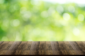 Beautiful wood floor and natural green bokeh background.