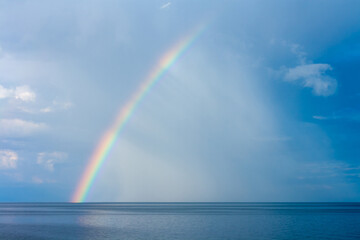 Rainbow over Lake Baikal. Horizontal image.