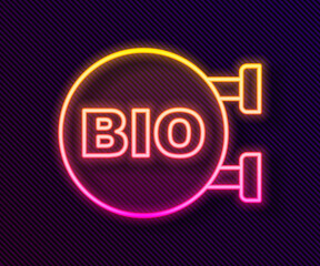 Glowing neon line Bio green healthy food icon isolated on black background. Organic product. Healthy food sticker. Vector