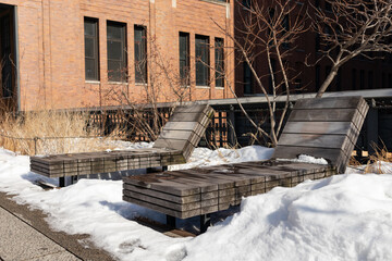 Empty Chairs at The High Line with Snow during Winter in Chelsea of New York City