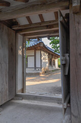 Korean Confucian Academy from Joseon Dynasty era. Courtyard view trough gate of traditional korean buildings. Byeongsan Seowon, Andong, South Korea.