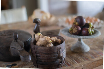 decor on antique kitchen table with ginger