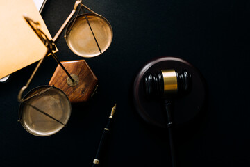 Business and lawyers discussing contract papers with brass scale on desk in office. Law, legal services, advice, justice and law concept picture with film grain effect