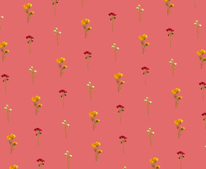 pattern made with yellow, red and white roses on pink background. summer tropical abstract art. summer sunny background.