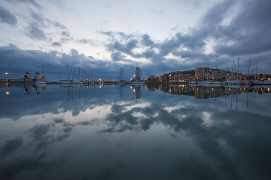 Sicilian harbour scenery in the evening   