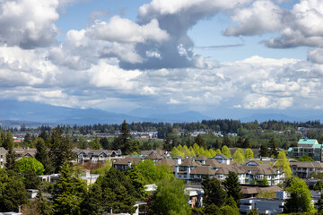 Obraz premium Aerial View of Residential Homes in a peaceful neighborhood on the West Coast. Sunny Spring Day. White Rock, Vancouver, British Columbia, Canada.