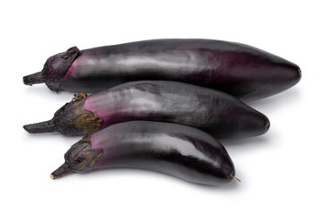 Three fresh ripe purple eggplant close up isolated on white background   