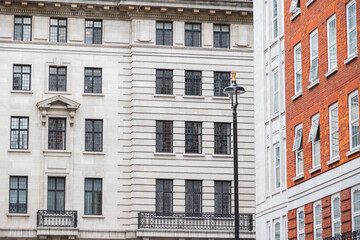 Facade of a grand Portland stone mansion flat building, Chiltern Court, in London
