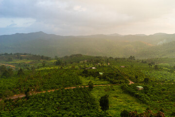 Beautiful view of local valley and mountain in misty near Bao Loc city, Lam Dong province, Vietnam