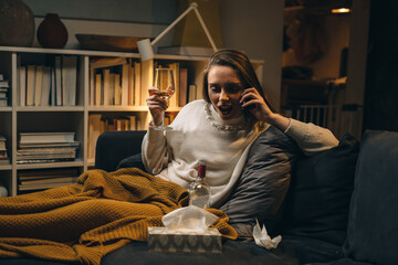 depressed woman drinking at home