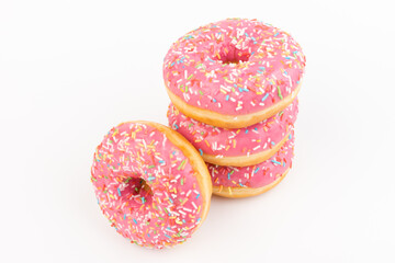 Fresh made Donuts isolated on white background. Doughnuts are traditional sweet pastries. Copy space for text.