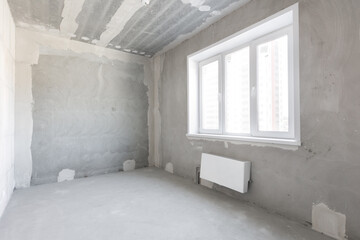 interior of the apartment without decoration in gray colors
