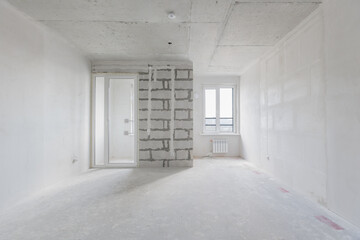 interior of the apartment without decoration in gray colors