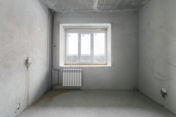interior of the apartment without decoration in gray colors