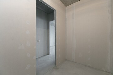 interior of the apartment without decoration in gray colors