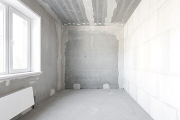 interior of the apartment without decoration in gray colors