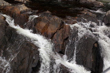 Stream cascading through rocks ourdoors
