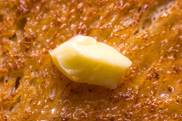 Melting butter on a slice of toast
