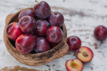 ripe plums on the table