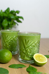 Delicious and healthy green smoothie with lime and spinach