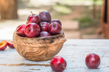 ripe plums on the table