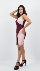 Fototapeta premium Sexy business woman red dress posing in studio white background. Sexy Asian black hair girl with full lips gesturing to camera. Attractive business female with big breast. posing in studio shooting. 