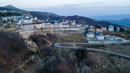 Aerial view of Modern residential complex in beutiful mountains in Kopaonik Serbia, Europe.