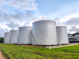 Oil storage tank In industrial areas. Crude oil storage plant For export. Palm oil factories in Asia. Within the industrial plant. Zone tank storage industrial 