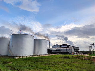 Oil storage tank In industrial areas. Crude oil storage plant For export. Palm oil factories in Asia. Within the industrial plant. Zone tank storage industrial 