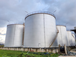 Oil storage tank In industrial areas. Crude oil storage plant For export. Palm oil factories in Asia. Within the industrial plant. Zone tank storage industrial 
