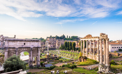 Sunrise light with blue sky on Roman ancient architecture in Rome, Italy