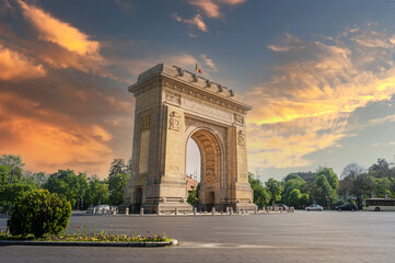 Historical monument in Buchareast, Arch of Triumph representing the victory of Romanian soldiers who managed to liberate the capital in the second world war. - obrazy, fototapety, plakaty