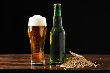 alcoholic drinks, beer with foam isolated on black background..