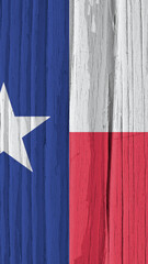 Texas state flag on dry wooden surface. Vertical bright background. Mobile phone wallpaper made of old wood. The symbol of one of the American states. Lone Star State. Solar lighting with hard shadows