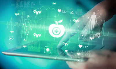 Close-up of a touchscreen with healthcare icons