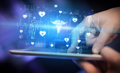 Fototapeta premium Close-up of a touchscreen with healthcare icons