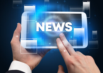 Close-up of a hand holding tablet