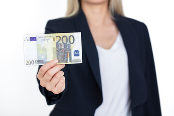 Business woman in suit holding a 200 euro banknote.
