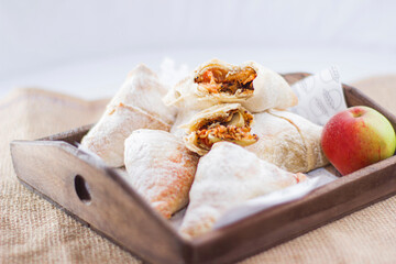 apple patty with cinnamon on a wooden table  - healthy food concept