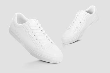 Mockup of a pair of sneakers isolated against plain background