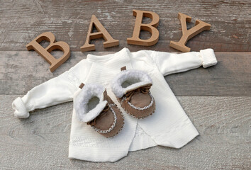 Lettering baby with baby shoes