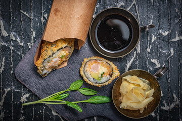 Still life. Japanese cuisine- roll in a package