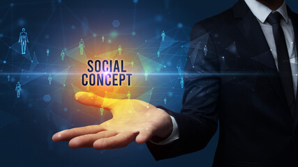 Hand holding social media related inscription