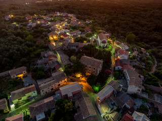 Agioi douloi village by night aerial view