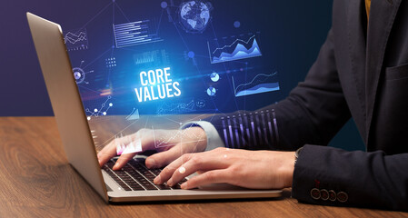 Businessman working on laptop, business concept